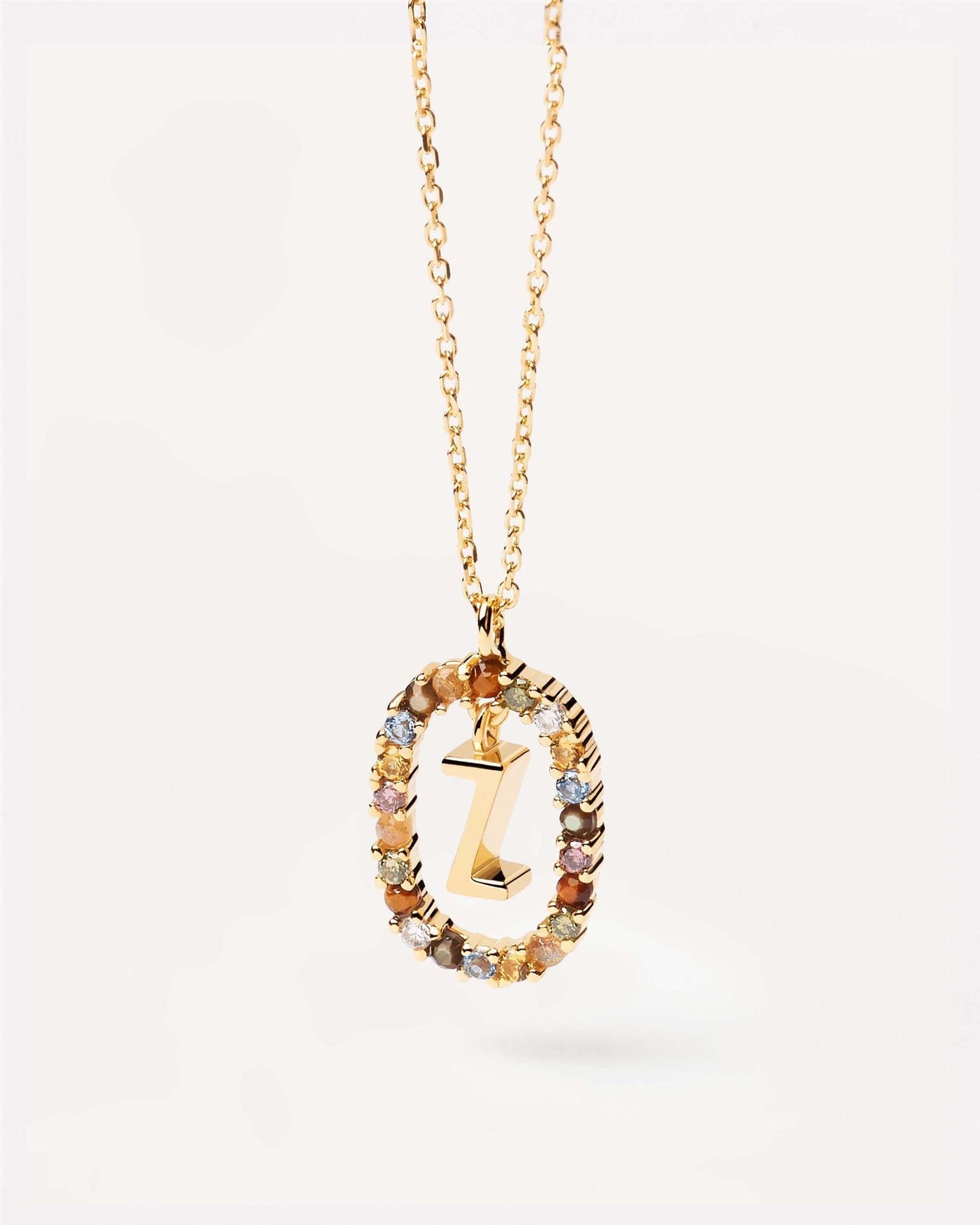 2023 Selection | Letter Z necklace. Initial Z necklace in gold-plated silver, circled by colorful gemstones. Get the latest arrival from PDPAOLA. Place your order safely and get this Best Seller. Free Shipping.
