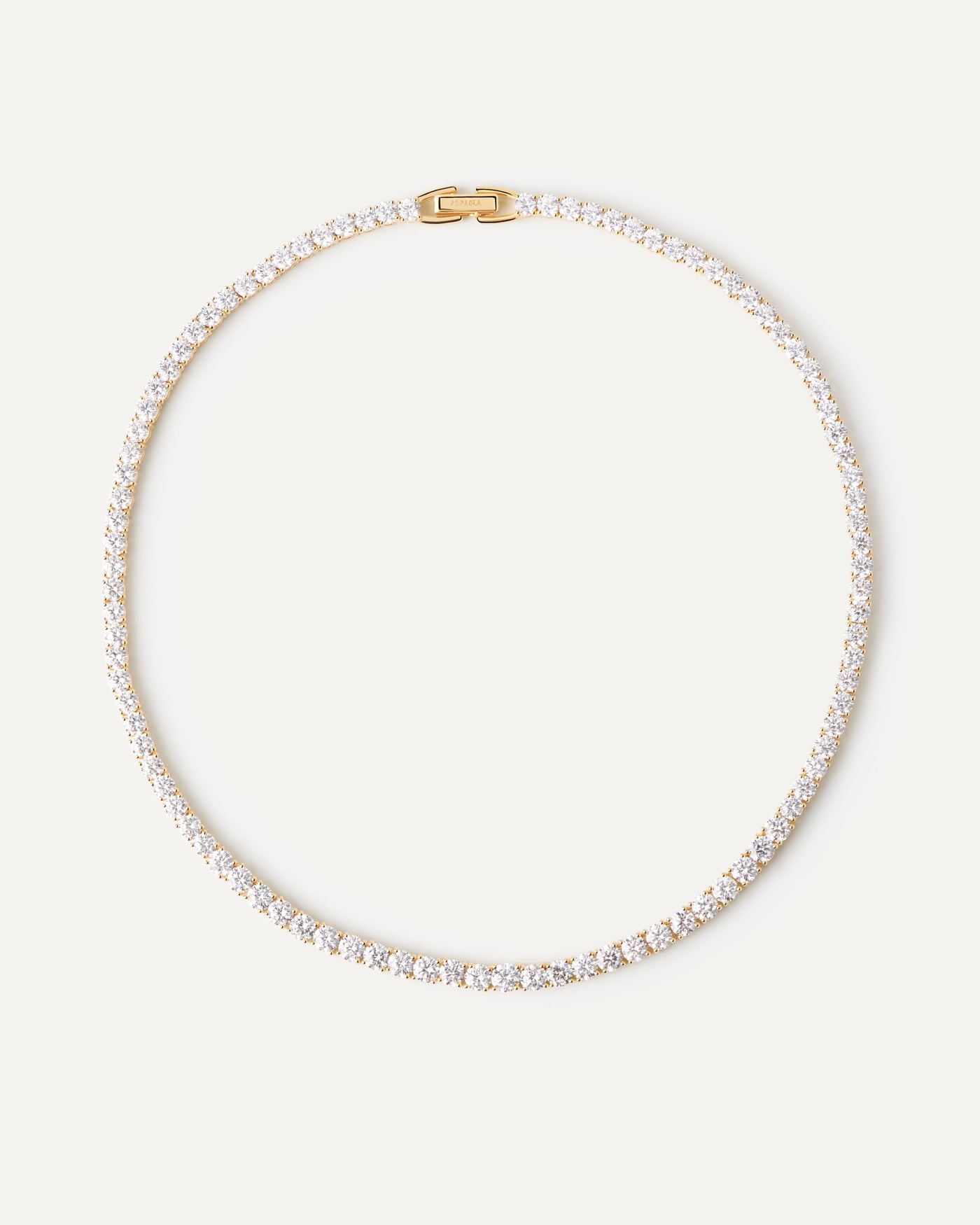 Collier Tennis Supreme. Collier en argent plaqué or à maille tennnis en zircons blancs. Découvrez les dernières nouveautés de chez PDPAOLA. Commandez et recevez votre bijou en toute sérénité.