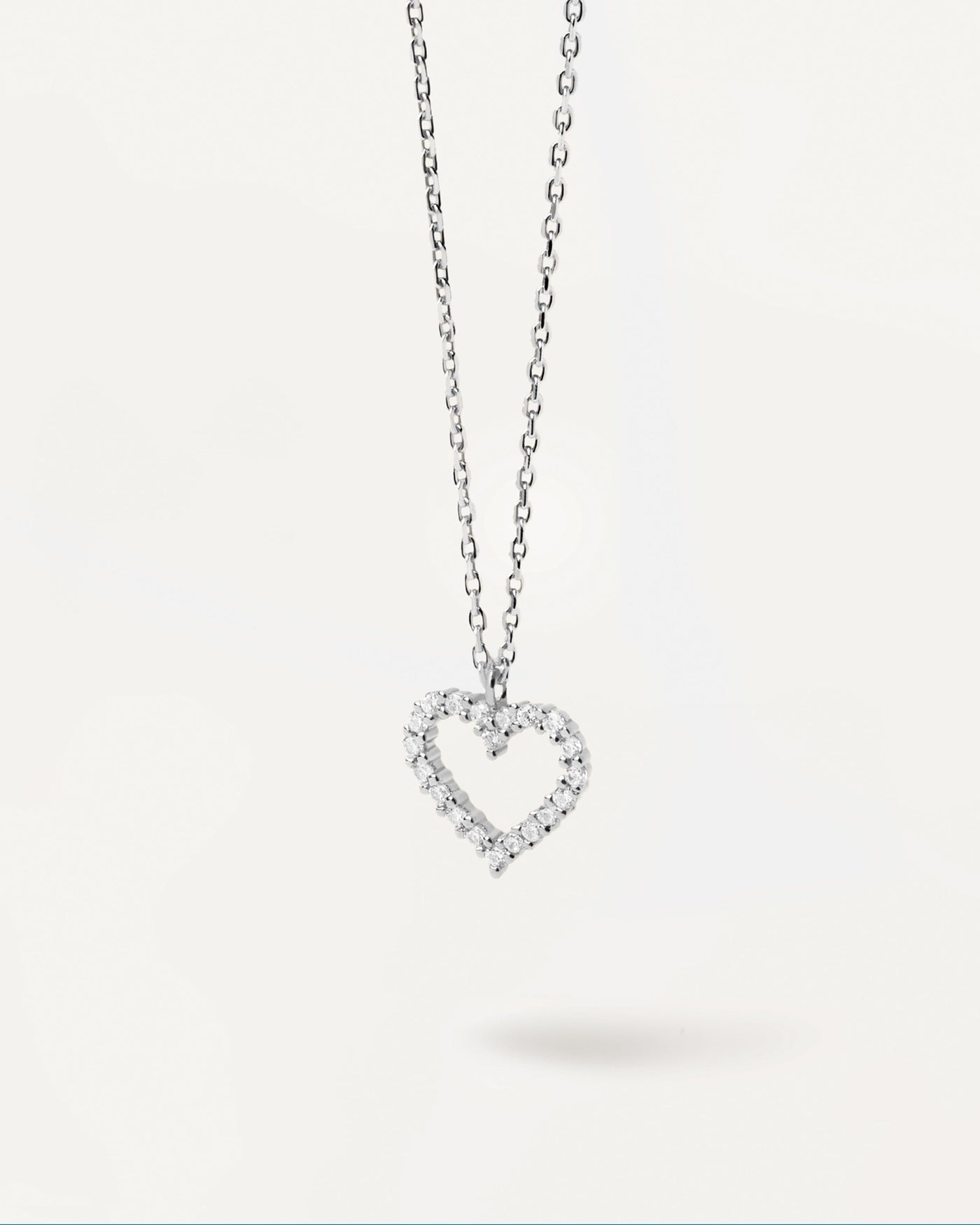 2023 Selection | White Heart Necklace Silver. Heart pendant set with white zirconia stones on a sterling single link chain necklace. Get the latest arrival from PDPAOLA. Place your order safely and get this Best Seller. Free Shipping.