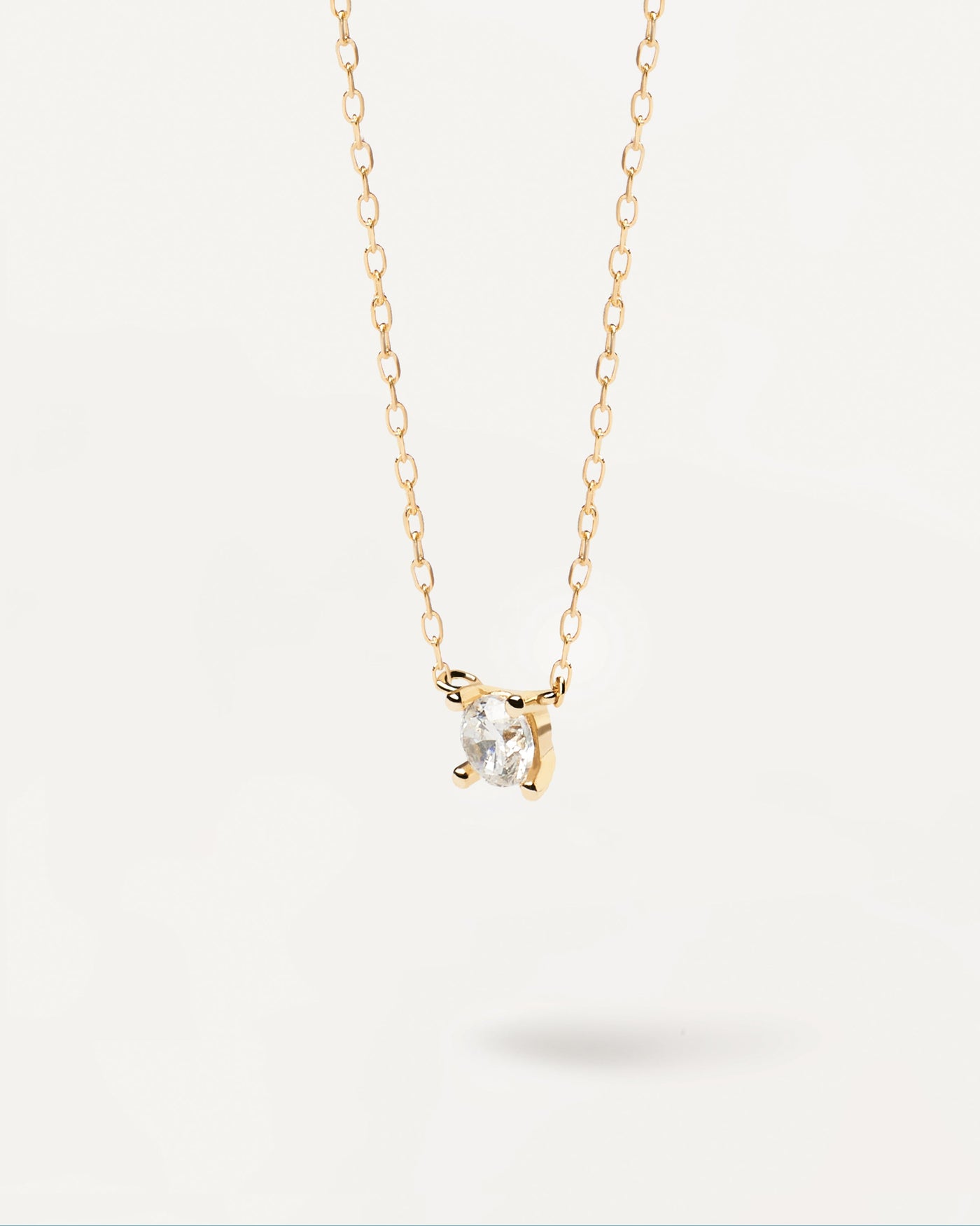 2023 Selection | Diamonds and Gold Solitaire Mini Necklace. Solid yellow gold chain necklace with small round solitary diamond of 0.10 carats. Get the latest arrival from PDPAOLA. Place your order safely and get this Best Seller. Free Shipping.