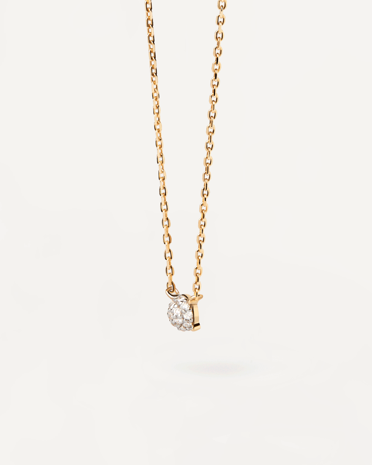 Diamonds and gold Dona solitary necklace. Solid yellow gold round solitary necklace with a four-prong pavé lab-grown diamond . Get the latest arrival from PDPAOLA. Place your order safely and get this Best Seller.