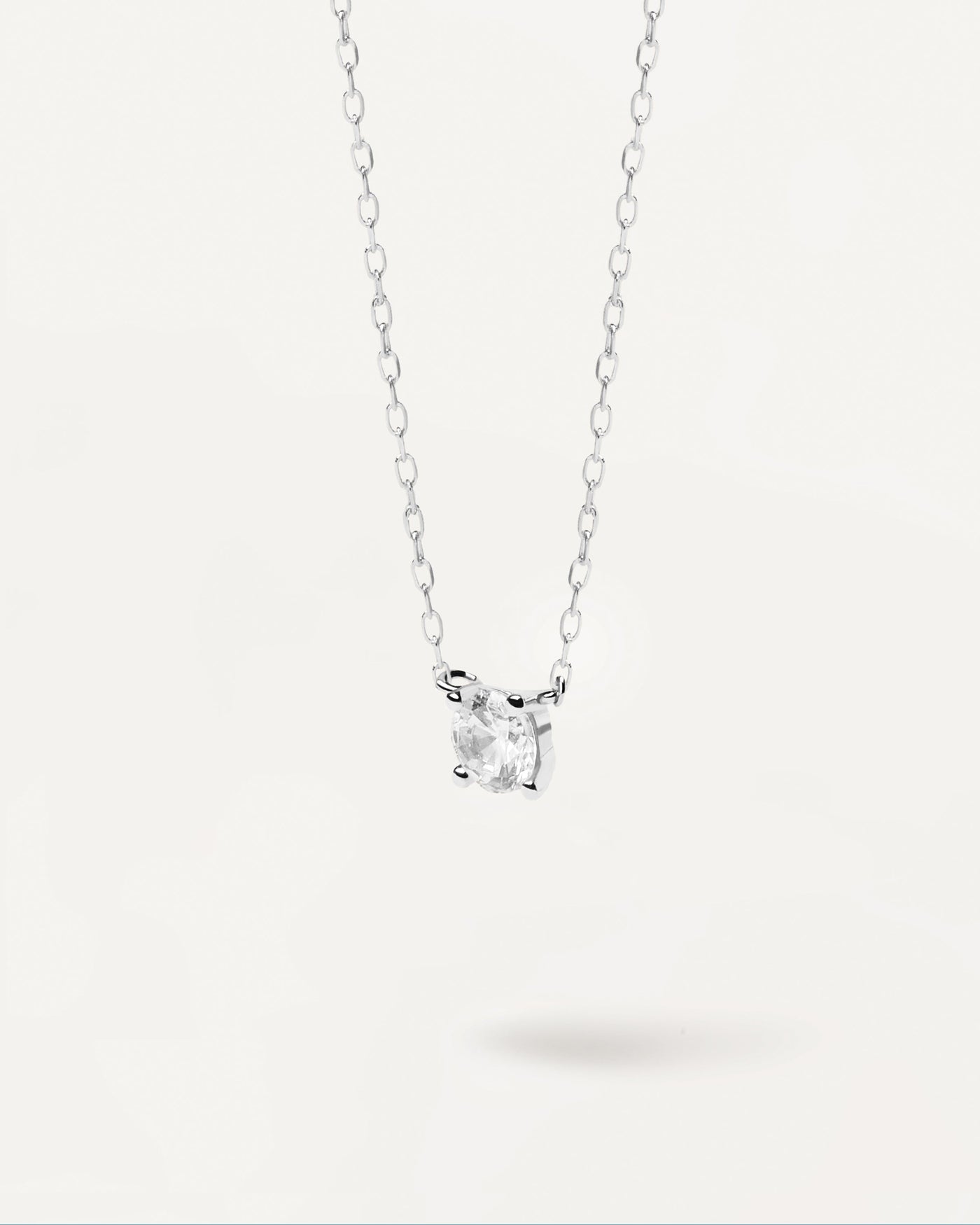 2023 Selection | Diamonds and White Gold Solitaire Medium Necklace. Solid white gold chain necklace with fine round lab-grown diamond of 0.20 carats. Get the latest arrival from PDPAOLA. Place your order safely and get this Best Seller. Free Shipping.