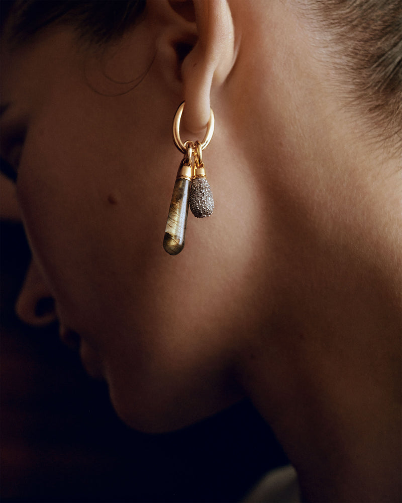 Single hoop with a grey gemstone drop pendant