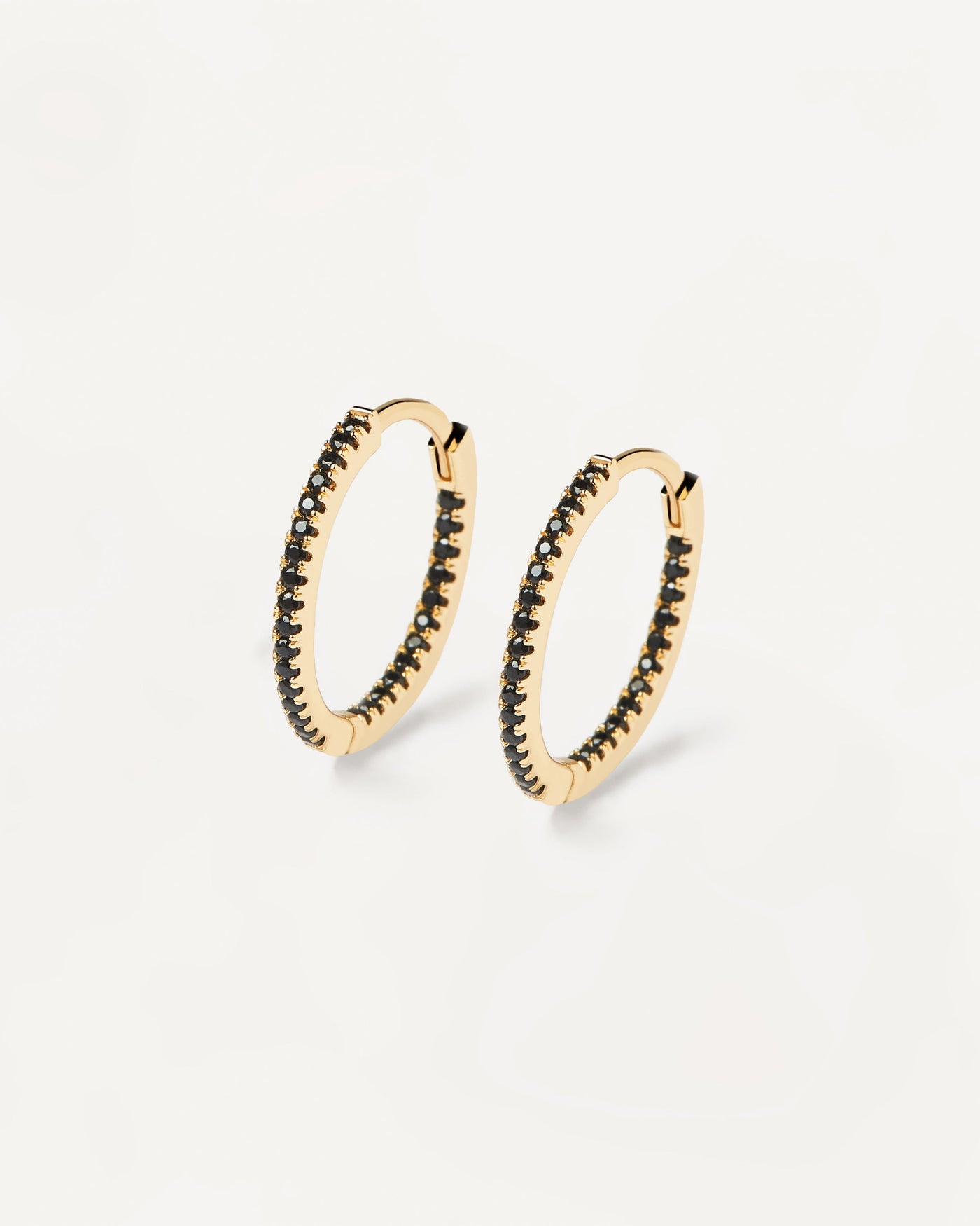 2023 Selection | Black Medium Hoops. Full hoop latch-back earrings in 18k gold plated silver set with black zirconia. Get the latest arrival from PDPAOLA. Place your order safely and get this Best Seller. Free Shipping.