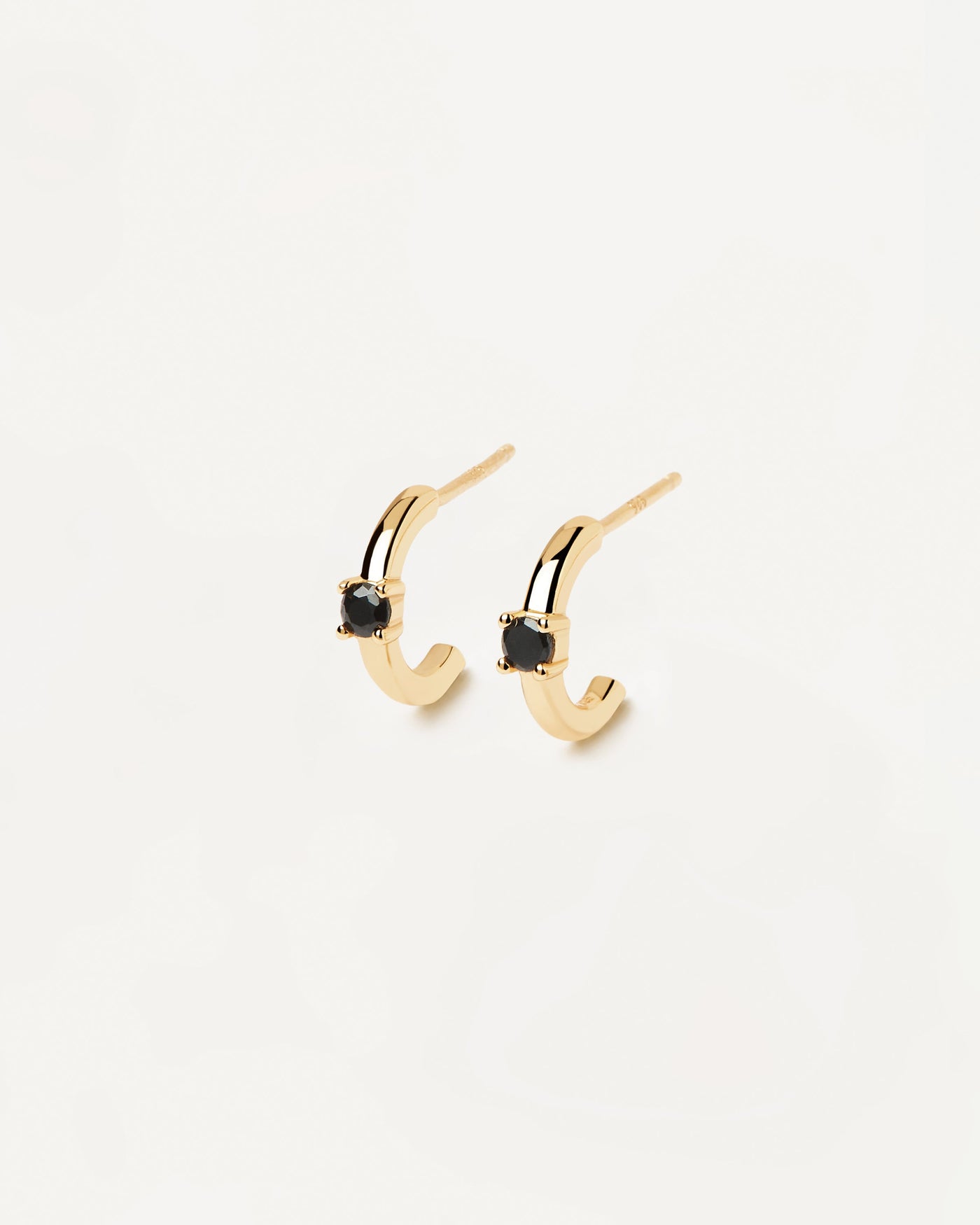 2023 Selection | Black Solitary Earrings. 18k gold plated silver c hoops with a round-cut black zirconia stone. Get the latest arrival from PDPAOLA. Place your order safely and get this Best Seller. Free Shipping.