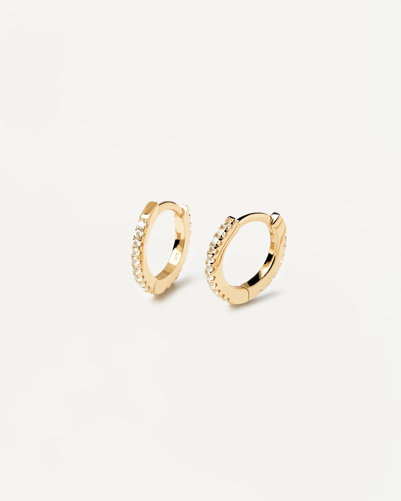 2023 Selection | White Mini Hoops. Hoop latch-back earrings in 18k gold plated silver set with white zirconia. Get the latest arrival from PDPAOLA. Place your order safely and get this Best Seller. Free Shipping.