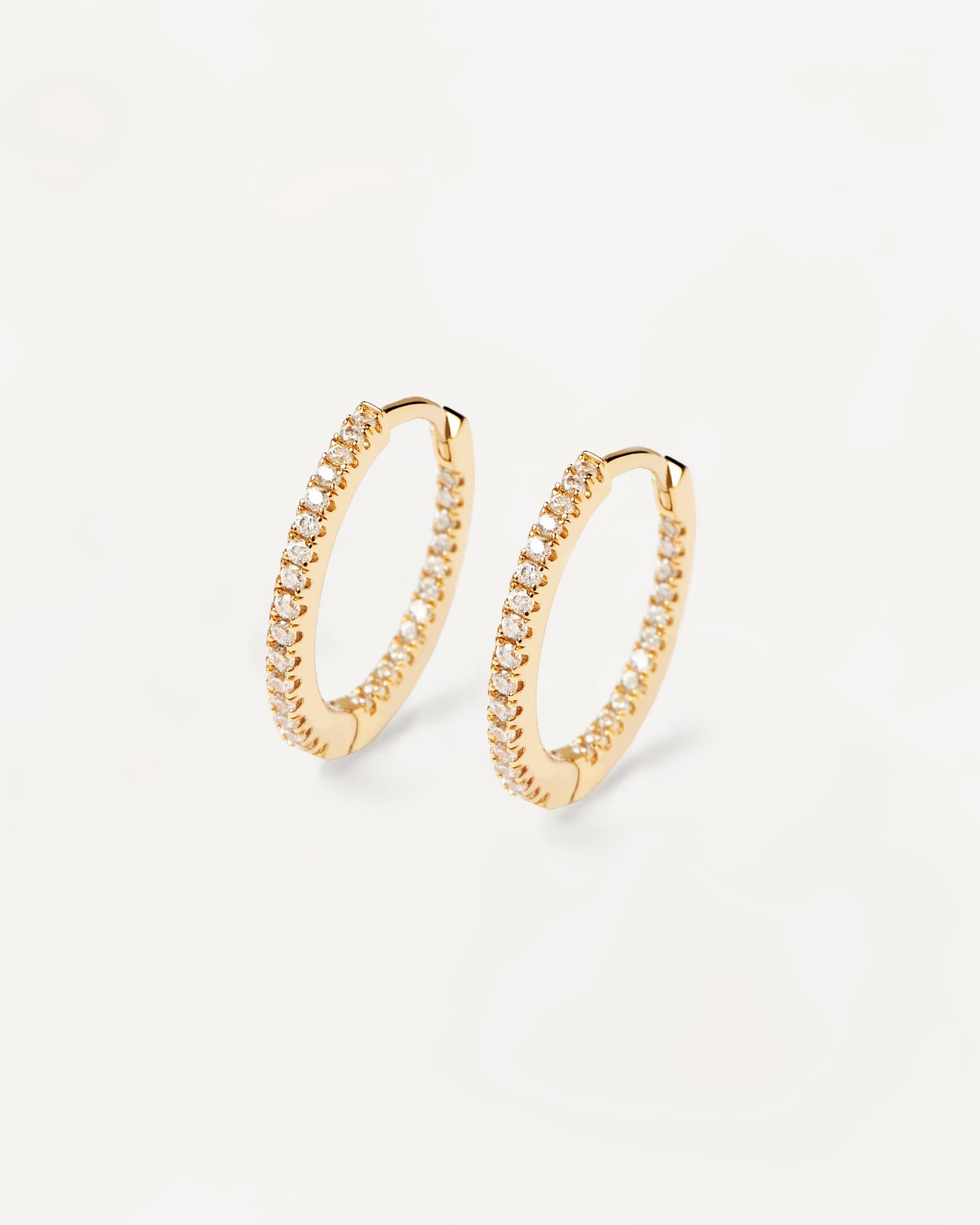 2023 Selection | White Medium Hoops. Full hoop latch-back earrings in 18k gold plated silver set with white zirconia. Get the latest arrival from PDPAOLA. Place your order safely and get this Best Seller. Free Shipping.