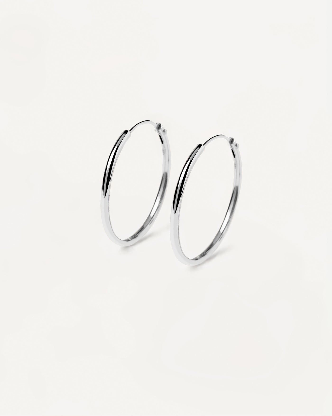 2023 Selection | Medium Hoops Silver. Classic round endless hoop earrings in 925 sterling silver. Get the latest arrival from PDPAOLA. Place your order safely and get this Best Seller. Free Shipping.