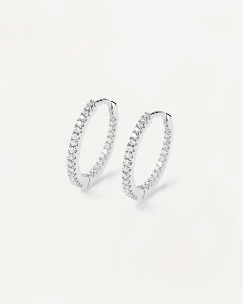 Full hoop latch-back earrings in sterling silver set with white zirconia