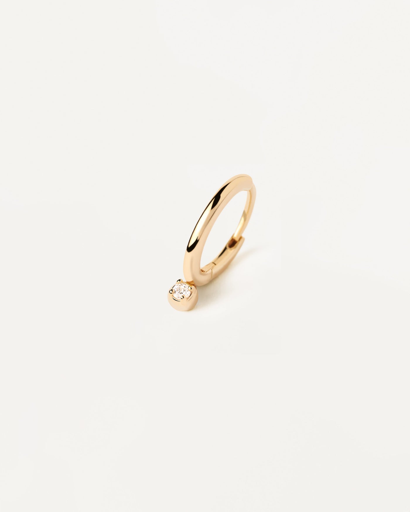 2023 Selection | Tide Single Hoop Earring. Gold-plated silver ear piercing with tiny white zirconia pendant. Get the latest arrival from PDPAOLA. Place your order safely and get this Best Seller. Free Shipping.