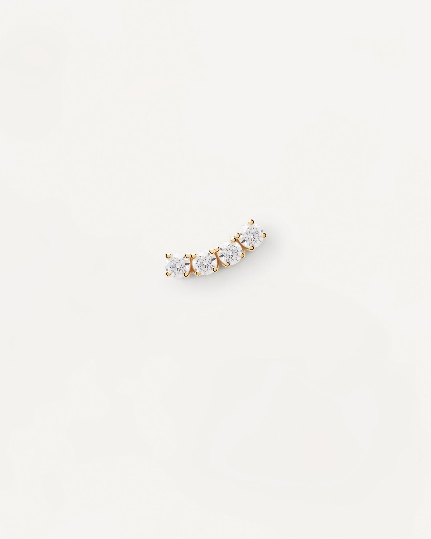 2023 Selection | Uma Single Earring. Wavy gold-plated ear piercing with 4 white zirconia. Get the latest arrival from PDPAOLA. Place your order safely and get this Best Seller. Free Shipping.
