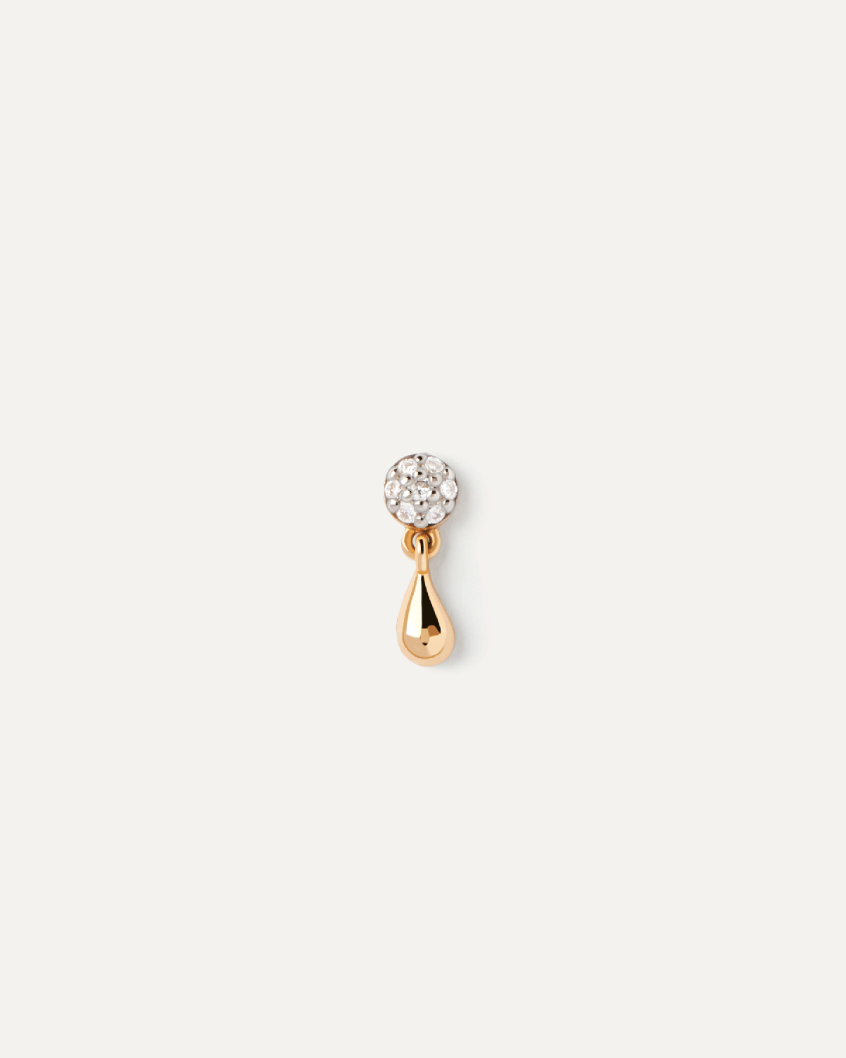 Diamonds and gold Noe single earring. Dainty ear piercing in solid yellow gold set with pavé lab-grown diamonds and a small drop pendant. Get the latest arrival from PDPAOLA. Place your order safely and get this Best Seller.