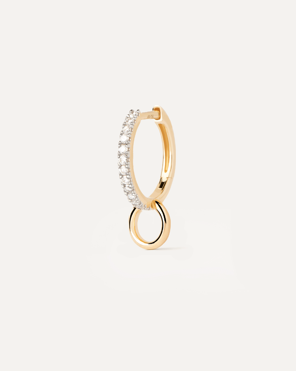Diamonds and gold Circle single hoop. Sleek single hoop in solid yellow gold and lab-grown diamonds with a swinging circular pendant. Get the latest arrival from PDPAOLA. Place your order safely and get this Best Seller.