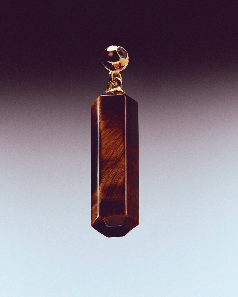 Charm Ojo De Tigre - 
  
    Plata de Ley / Baño de Oro 18K
  
