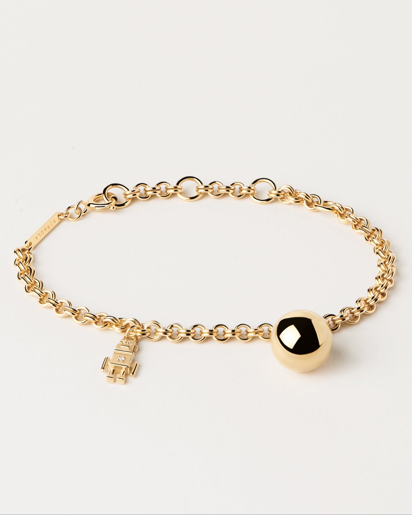 2023 Selection | Space Age Bracelet. Gold-plated silver chain bracelet with robot and ball motives. Get the latest arrival from PDPAOLA. Place your order safely and get this Best Seller. Free Shipping.