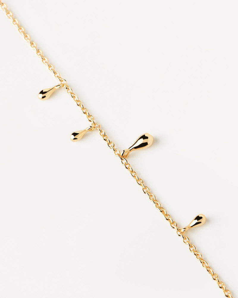 Gold-plated silver bracelet with small drop pendants