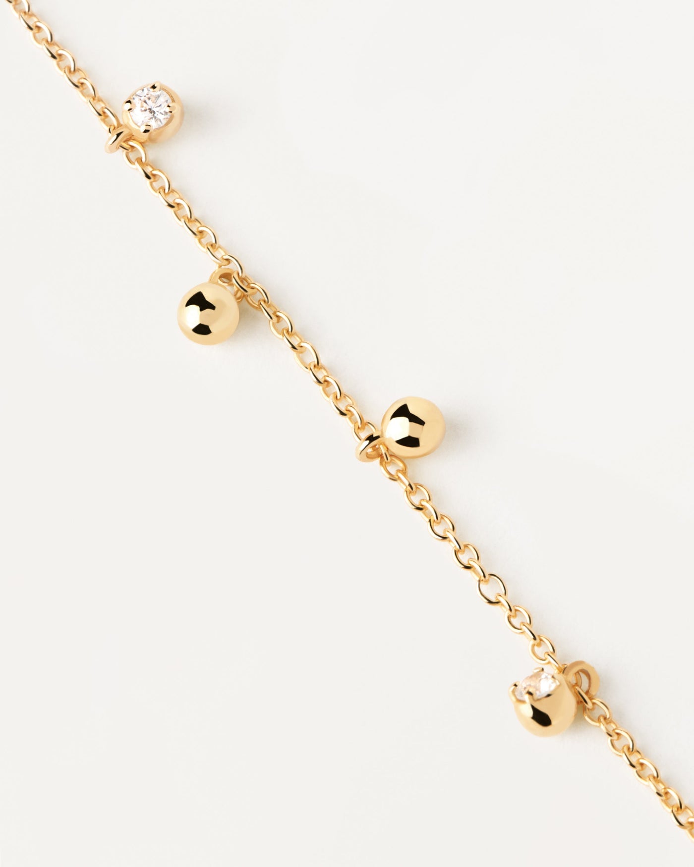 2023 Selection | Bubble Bracelet. Gold-plated silver bracelet with small zirconia and ball pendants. Get the latest arrival from PDPAOLA. Place your order safely and get this Best Seller. Free Shipping.