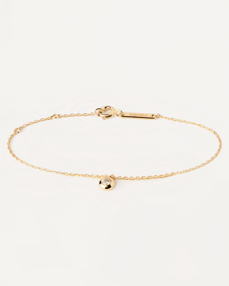 Bracciale solitaria minimalista di forma fluida con ciondolo di zirconi incastonati a filo