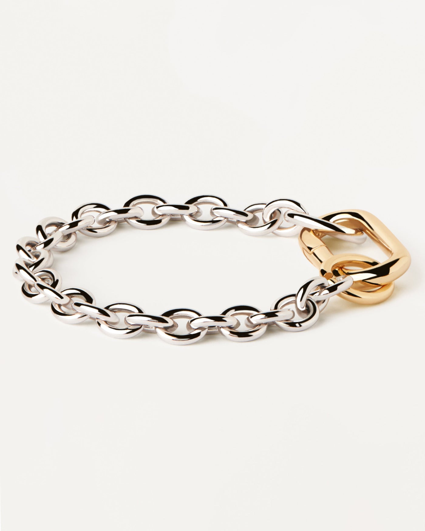 2023 Selection | Beat Chain Bracelet. Bicolor chain bracelet with silver links and bold gold-plated clasp. Get the latest arrival from PDPAOLA. Place your order safely and get this Best Seller. Free Shipping.