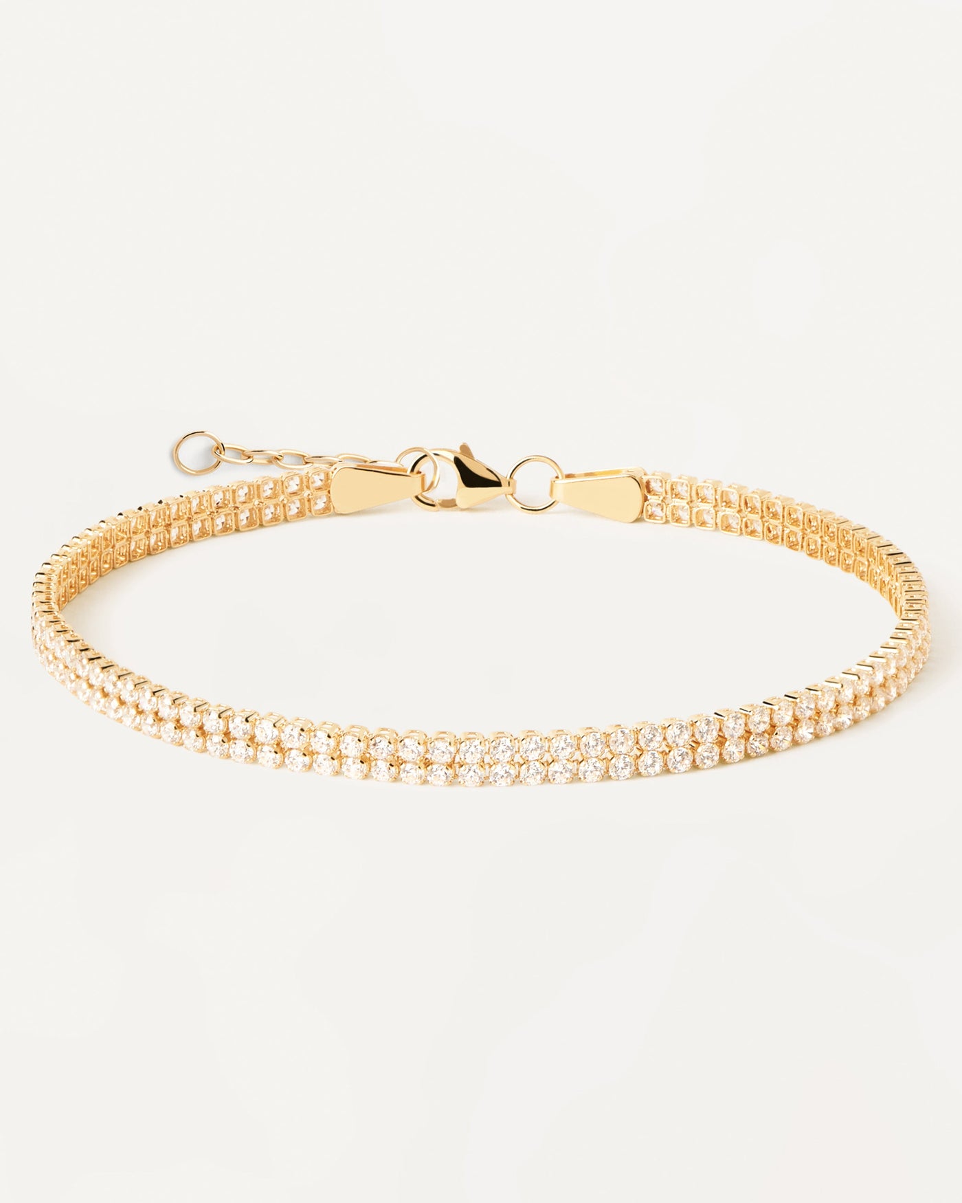 Bracciale in diamanti e oro Double Tennis. Bracciale a doppia catena tennis in oro giallo e diamanti lab-grown. Acquista le ultime novità di PDPAOLA. Effettua il tuo ordine in tutta sicurezza e non lasciarti sfuggire questo best seller.