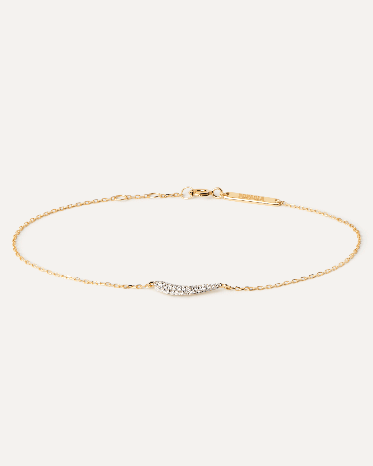 Diamonds and gold Nilo bracelet. Solid yellow gold bracelet with a curved point shape pavé lab-grown diamond of 0.13 carats. Get the latest arrival from PDPAOLA. Place your order safely and get this Best Seller.
