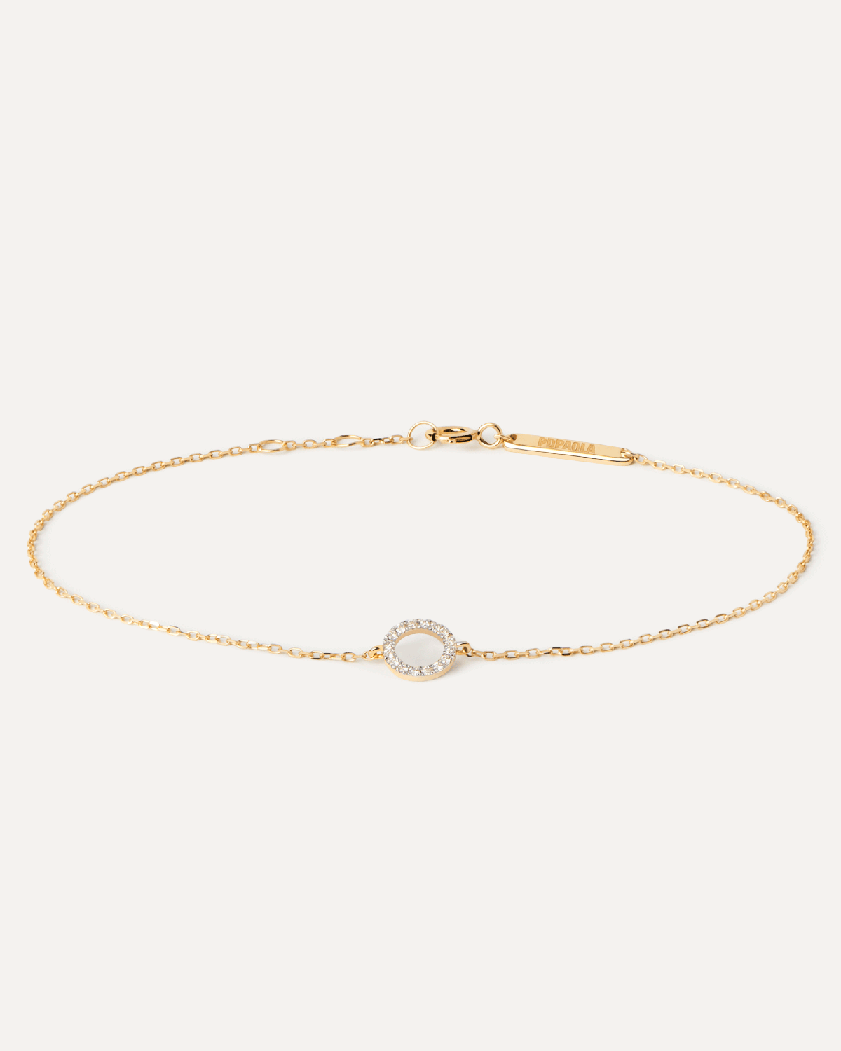 Diamonds and gold Circle bracelet. Solid yellow gold bracelet with a circle motif set with pavé lab-grown diamonds. Get the latest arrival from PDPAOLA. Place your order safely and get this Best Seller.