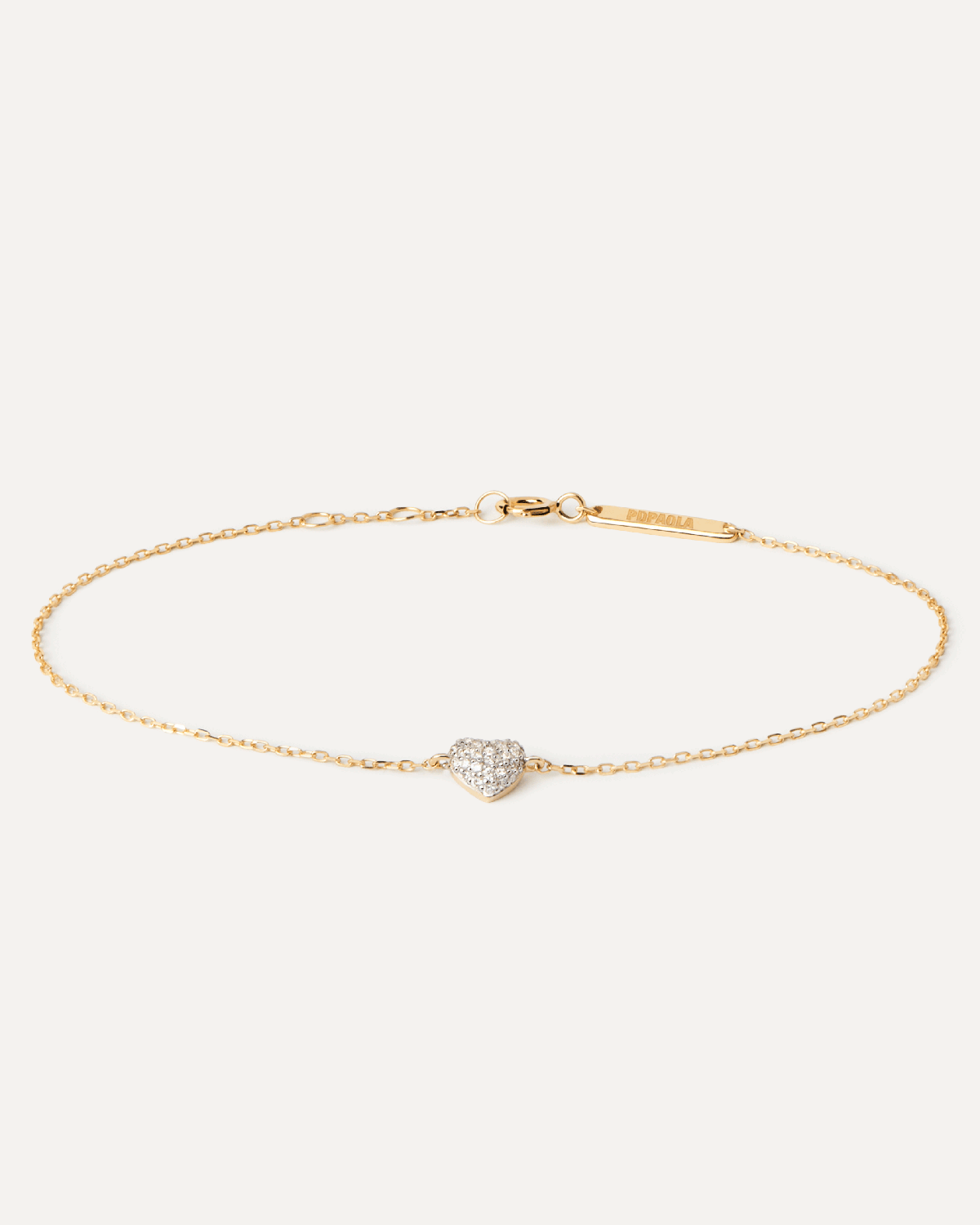 Diamonds and gold Heart bracelet. Solid yellow gold bracelet featuring a heart shape pavé lab-grown diamond of 0.11 carats. Get the latest arrival from PDPAOLA. Place your order safely and get this Best Seller.